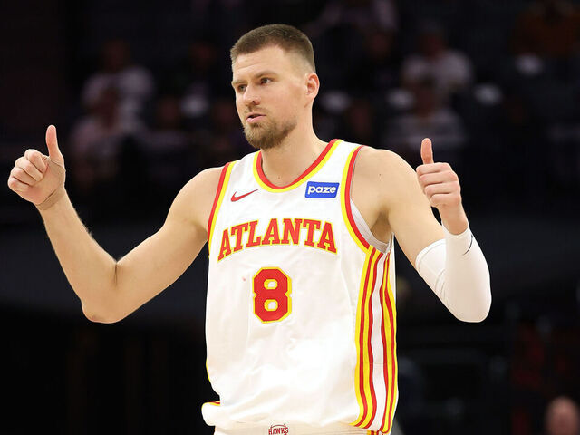 SACRAMENTO, CALIFORNIA - NOVEMBER 12: Kristaps Porzingis #8 of the Atlanta Hawks reacts after the Hawks made a basket against the Sacramento Kings during the second half at Golden 1 Center on November 12, 2025 in Sacramento, California. NOTE TO USER: User expressly acknowledges and agrees that, by downloading and/or using this photograph, user is consenting to the terms and conditions of the Getty Images License Agreement.