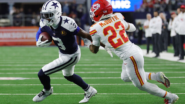 ARLINGTON, TEXAS - NOVEMBER 27: George Pickens #3 of the Dallas Cowboys carries the ball against Trent McDuffie #22 of the Kansas City Chiefs during the fourth quarter in the game at AT&T Stadium on November 27, 2025 in Arlington, Texas.