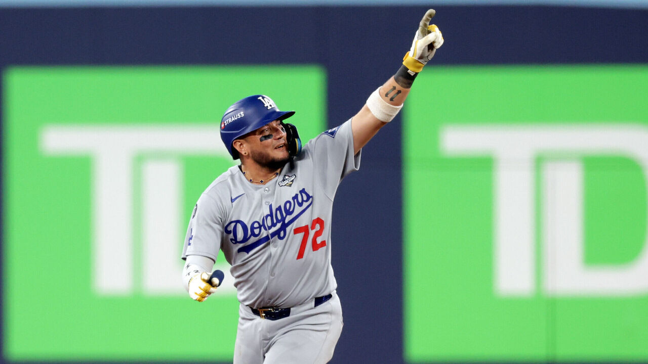 TORONTO, ON - NOVEMBER 01: Miguel Rojas #72 of the Los Angeles Dodgers rounds the bases after hitting a game-tying solo home run in the ninth inning during Game Seven of the 2025 World Series presented by Capital One between the Los Angeles Dodgers and the Toronto Blue Jays at Rogers Centre on Saturday, November 1, 2025 in Toronto, Ontario, Canada.