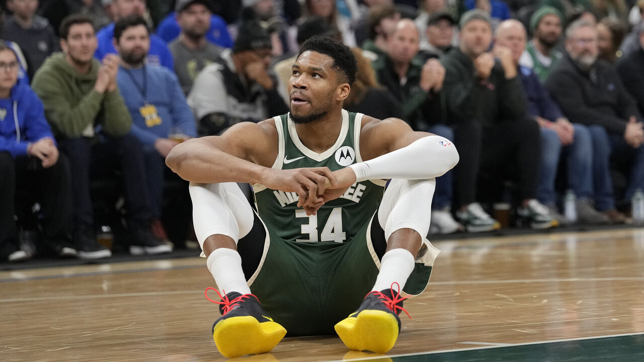 MILWAUKEE, WISCONSIN - DECEMBER 03: Giannis Antetokounmpo #34 of the Milwaukee Bucks reacts after an apparent injury against the Detroit Pistons during the first quarter at Fiserv Forum on December 03, 2025 in Milwaukee, Wisconsin.