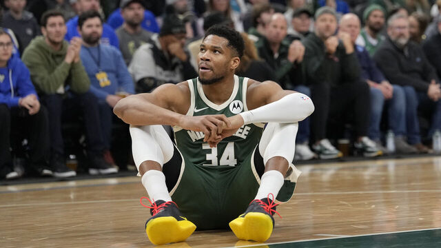 MILWAUKEE, WISCONSIN - DECEMBER 03: Giannis Antetokounmpo #34 of the Milwaukee Bucks reacts after an apparent injury against the Detroit Pistons during the first quarter at Fiserv Forum on December 03, 2025 in Milwaukee, Wisconsin.