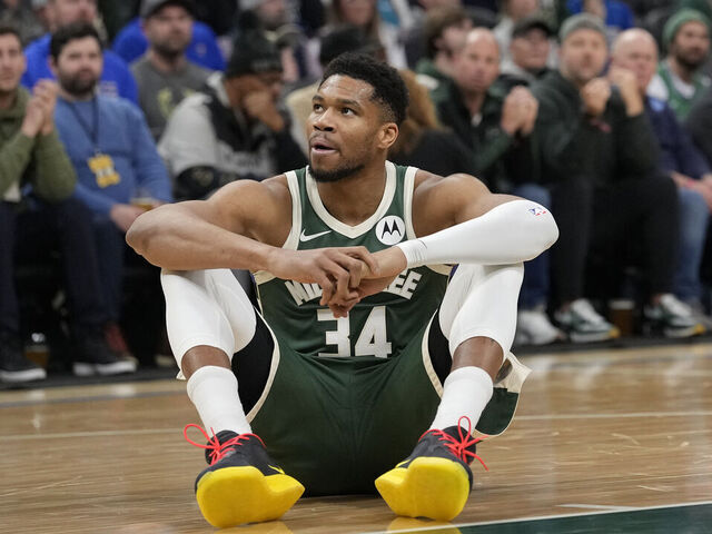 MILWAUKEE, WISCONSIN - DECEMBER 03: Giannis Antetokounmpo #34 of the Milwaukee Bucks reacts after an apparent injury against the Detroit Pistons during the first quarter at Fiserv Forum on December 03, 2025 in Milwaukee, Wisconsin.