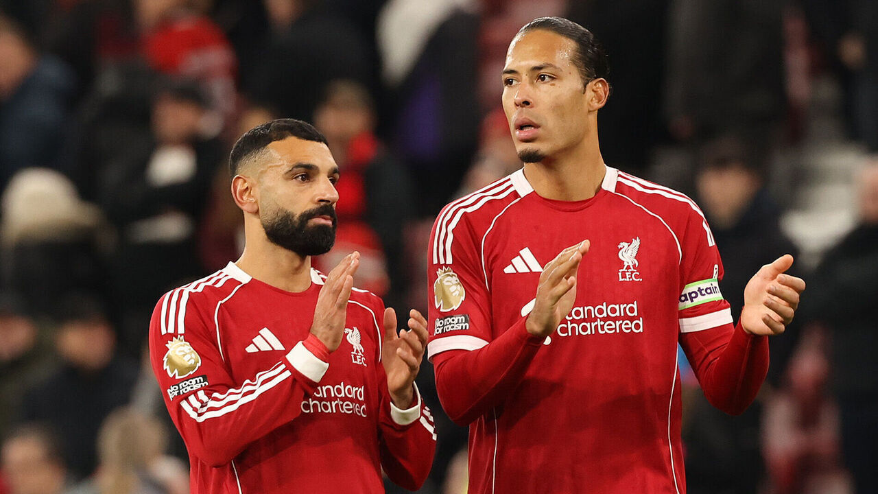 LIVERPOOL, ENGLAND - DECEMBER 03: (THE SUN OUT, THE SUN ON SUNDAY OUT) Mohamed Salah and Virgil van Dijk of Liverpool applaud fans after the Premier League match between Liverpool and Sunderland at Anfield on December 03, 2025 in Liverpool, England.