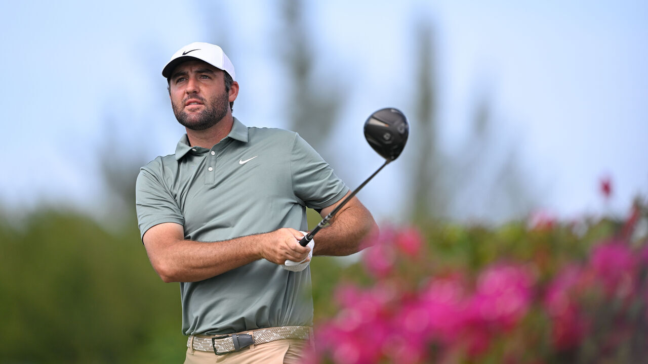 NASSAU, BAHAMAS - DECEMBER 04: Scottie Scheffler plays a tee shot on the fourth hole during the first round of the Hero World Challenge at Albany Golf Course on December 4, 2025 in Naussau, New Providence.