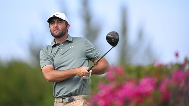 NASSAU, BAHAMAS - DECEMBER 04: Scottie Scheffler plays a tee shot on the fourth hole during the first round of the Hero World Challenge at Albany Golf Course on December 4, 2025 in Naussau, New Providence.