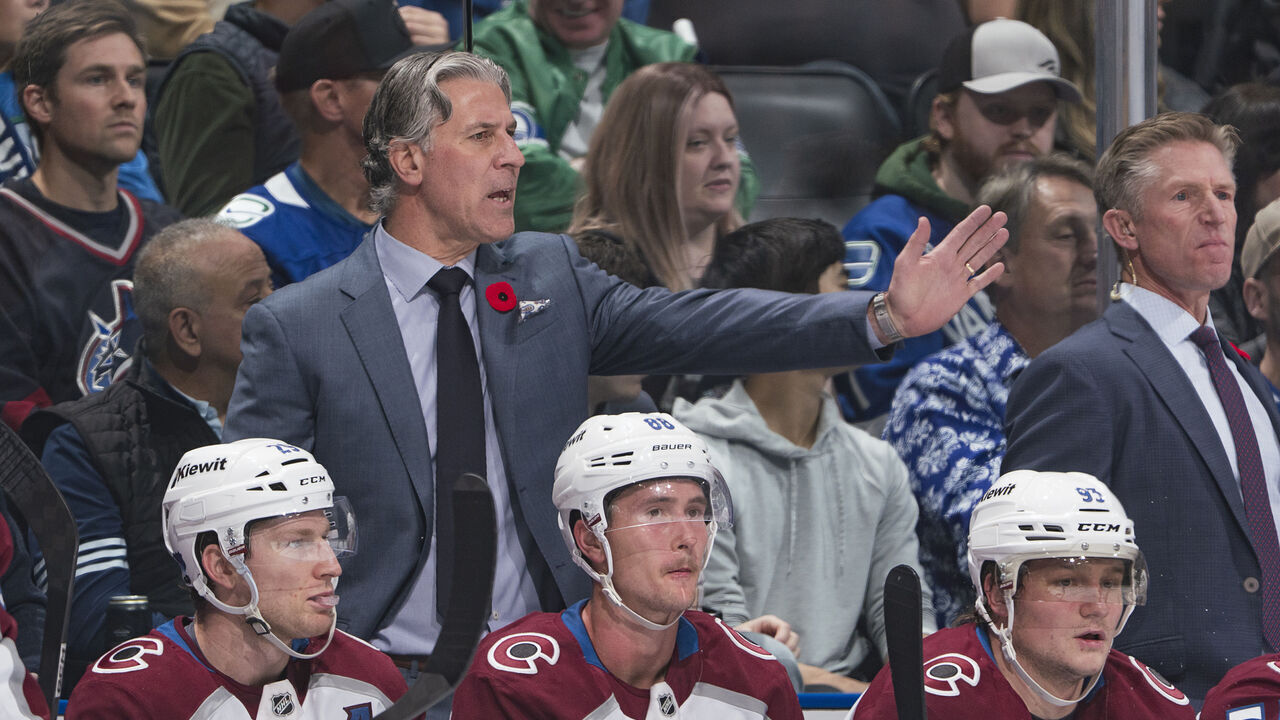 VANCOUVER, CANADA - NOVEMBER 9: Head coach Jared Bednar of the Colorado Avalanche looks on from the bench during their NHL game against the Vancouver Canucks at Rogers Arena on November 9, 2025 in Vancouver, British Columbia, Canada.