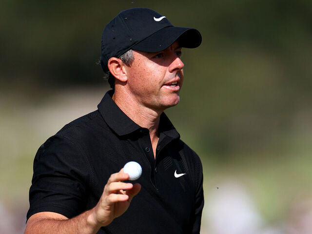 MELBOURNE, AUSTRALIA - DECEMBER 05: Rory McIlroy of Northern Ireland acknowledges the gallery on the 18th hole on day two of the Crown Australian Open 2025 at The Royal Melbourne Golf Club on December 05, 2025 in Melbourne, Australia.