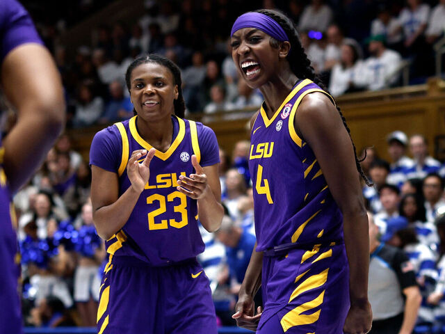 DURHAM, NORTH CAROLINA - DECEMBER 4: Milaysia Fulwiley #23 and Flau'Jae Johnson #4 of the LSU Tigers react in the first half against the Duke Blue Devils at Cameron Indoor Stadium on December 4, 2025 in Durham, North Carolina.