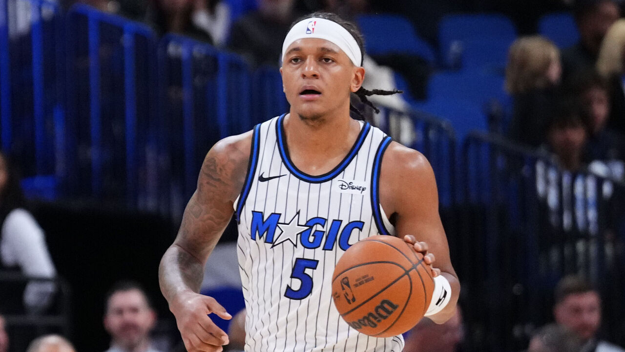 ORLANDO, FLORIDA - NOVEMBER 10: Paolo Banchero #5 of the Orlando Magic dribbles the ball up the court against the Portland Trail Blazers during the second half at Kia Center on November 10, 2025 in Orlando, Florida.