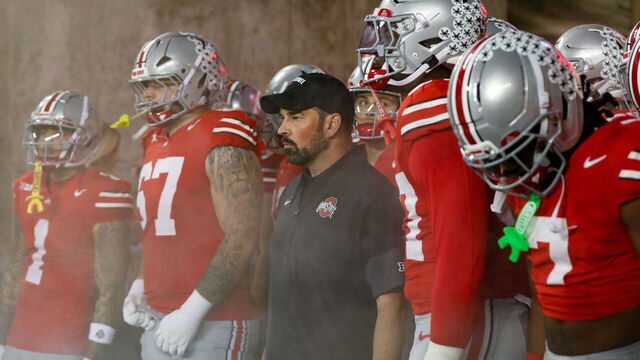 COLUMBUS, OH - OCTOBER 04: Ohio State Buckeyes head coach Ryan Day stands with his players before the game against the Minnesota Golden Gophers and the Ohio State Buckeyes on October 4, 2025, at Ohio Stadium in Columbus, OH.