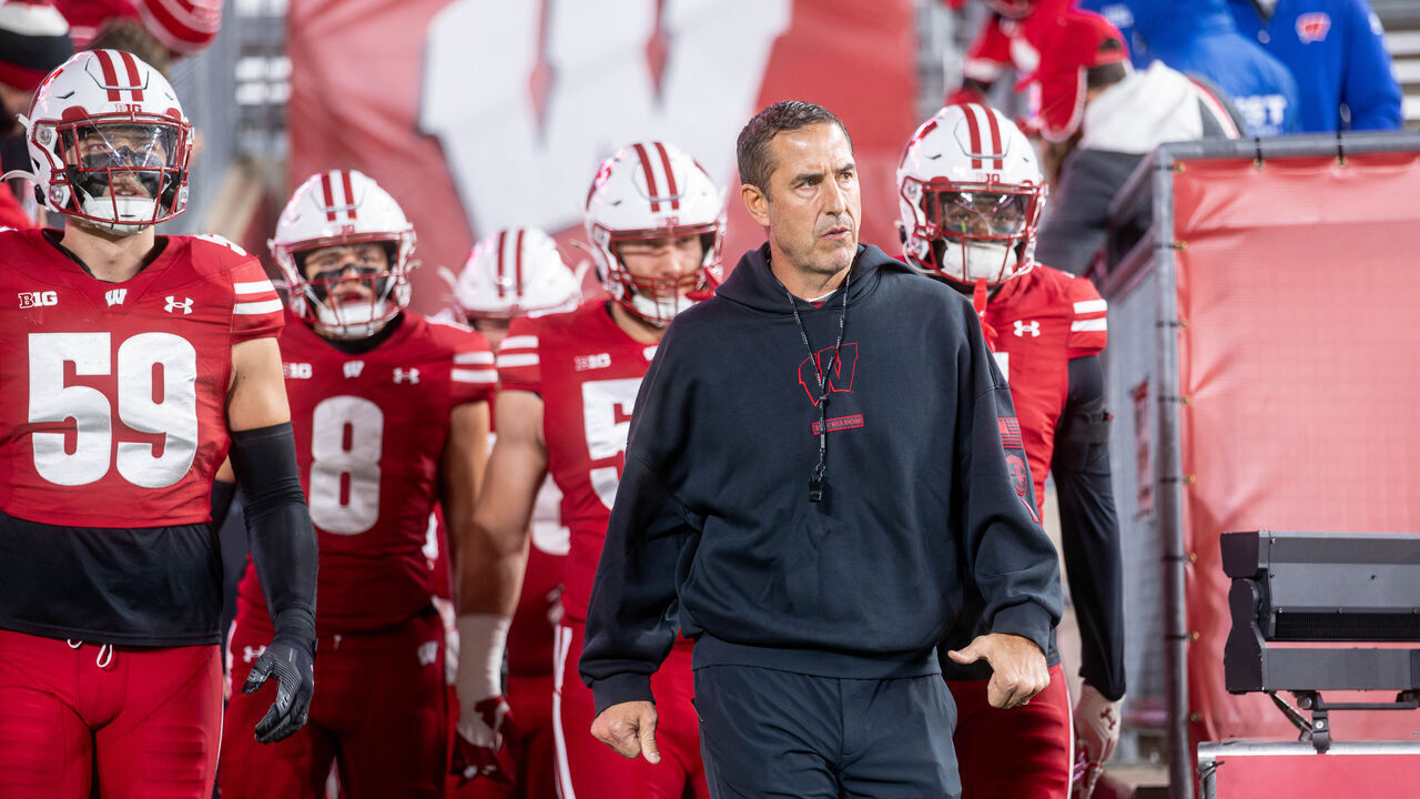 Wisconsin Badgers head coach Luke Fickell leads the Wisconsin Badgers onto the field before playing the Illinois Fighting Illini at Camp Randall Stadium in Madison, Wisconsin, on November 22, 2025.