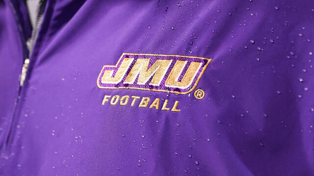 CONWAY, SOUTH CAROLINA - NOVEMBER 25: The James Madison Dukes football logo is soaked after a gatorade bath on Head coach Curt Cignetti of the James Madison Dukes after defeating Coastal Carolina Chanticleers, 56-14, at Brooks Stadium on November 25, 2023 in Conway, South Carolina.