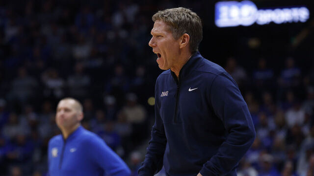 NASHVILLE, TN - DECEMBER 05: Gonzaga Bulldogs head coach Mark Few yells to his team from the sideline as Kentucky Wildcats head coach Mark Pope looks on during a game between the Kentucky Wildcats and Gonzaga Bulldogs, December 5, 2025, at Bridgestone Arena in Nashville, Tennessee.