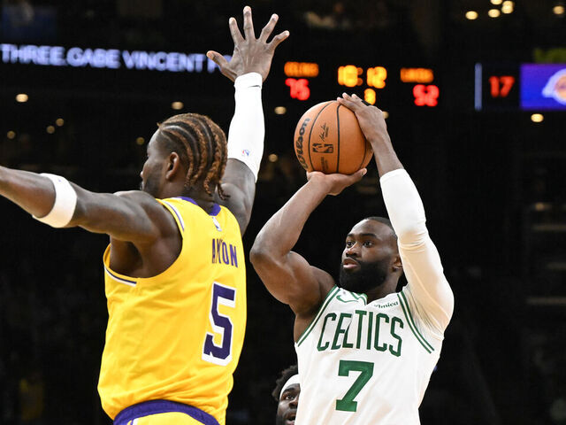 BOSTON, MASSACHUSETTS - DECEMBER 05: Jaylen Brown #7 of the Boston Celtics attempts a basket against the Los Angeles Lakers during the second half at the TD Garden on December 05, 2025 in Boston, Massachusetts.