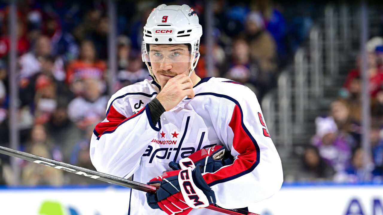 ELMONT, NEW YORK - NOVEMBER 30: Ryan Leonard #9 of the Washington Capitals looks on during the game against the New York Islanders at UBS Arena on November 30, 2025 in Elmont, New York.