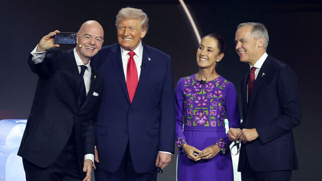WASHINGTON, DC - DECEMBER 05: U.S. President Donald Trump, Claudia Sheinbaum, President of Mexico, and Mark Carney, Prime Minister of Canada, pose for a selfie with Gianni Infantino, President of FIFA, during the FIFA World Cup 2026 Official Draw at John F. Kennedy Center for the Performing Arts on December 05, 2025 in Washington, DC.