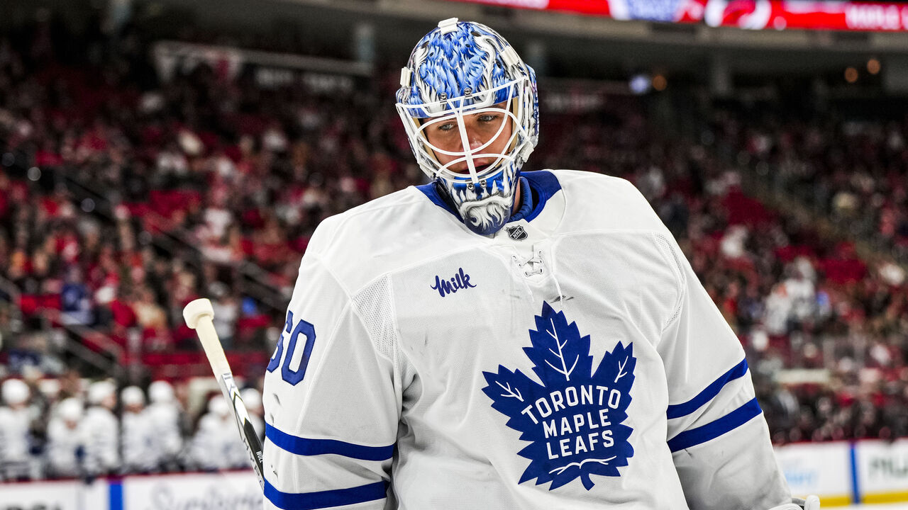 RALEIGH, NORTH CAROLINA - DECEMBER 04: Goaltender Joseph Woll #60 of the Toronto Maple Leafs skates during a stoppage in play during the first period of a game against the Carolina Hurricanes at Lenovo Center on December 4, 2025 in Raleigh, North Carolina.