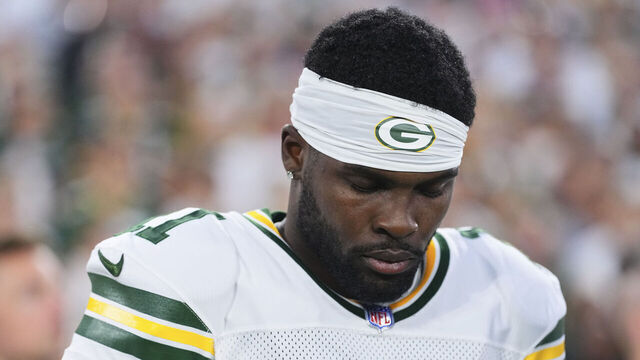 GREEN BAY, WI - SEPTEMBER 11: Jayden Reed #11 of the Green Bay Packers looks on from the sideline during the national anthem prior to an NFL football game against the Washington Commanders during at Lambeau Field on September 11, 2025 in Green Bay, Wisconsin.