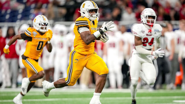 DETROIT, MICHIGAN - DECEMBER 06: Jalen Buckley #6 of the Western Michigan Broncos runs to score a touchdown against the Miami (OH) RedHawks during the first quarter of the 2025 MAC Football Championship at Ford Field on December 06, 2025 in Detroit, Michigan.