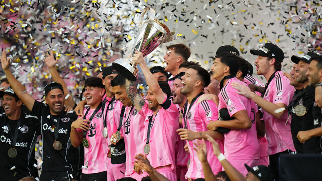 FORT LAUDERDALE, FLORIDA - DECEMBER 06: Lionel Messi #10 of Inter Miami CF lifts the Champion's trophy after winning the Audi 2025 MLS Cup Final match between Inter Miami CF and Vancouver Whitecaps FC at Chase Stadium on December 06, 2025 in Fort Lauderdale, Florida.