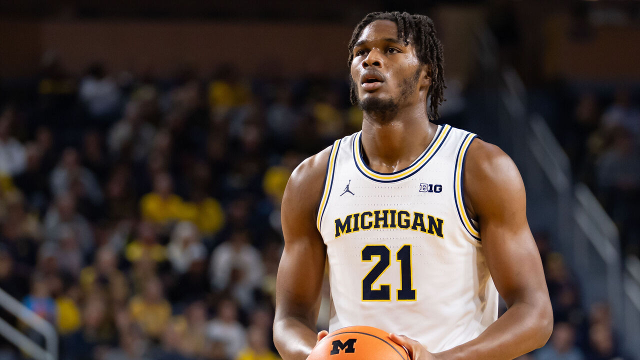 ANN ARBOR, MICHIGAN - NOVEMBER 3: Morez Johnson Jr. #21 of the Michigan Wolverines prepares to shoot a free throw during the first half against the Oakland Golden Grizzlies at Crisler Arena on November 3, 2025 in Ann Arbor, Michigan.
