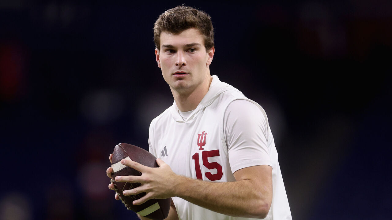 INDIANAPOLIS, INDIANA - DECEMBER 06: Fernando Mendoza #15 of the Indiana Hoosiers warms up before the 2025 Big Ten Football Championship against the Ohio State Buckeyes at Lucas Oil Stadium on December 06, 2025 in Indianapolis, Indiana.