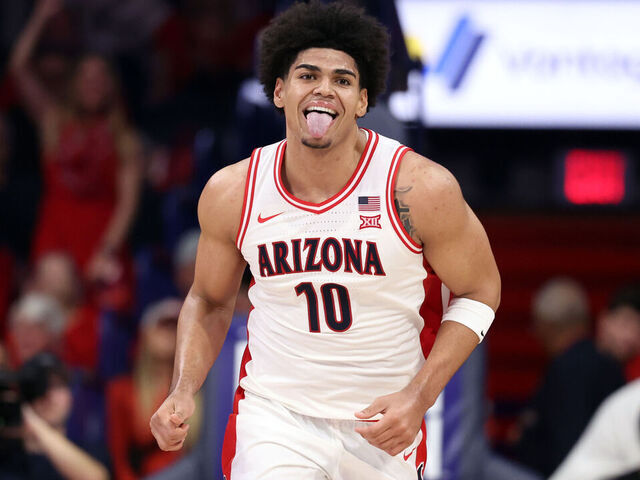 TUCSON, ARIZONA - DECEMBER 06: Koa Peat #10 of the Arizona Wildcats reacts after a basket during the second half against the Auburn Tigers at McKale Center on December 06, 2025 in Tucson, Arizona.