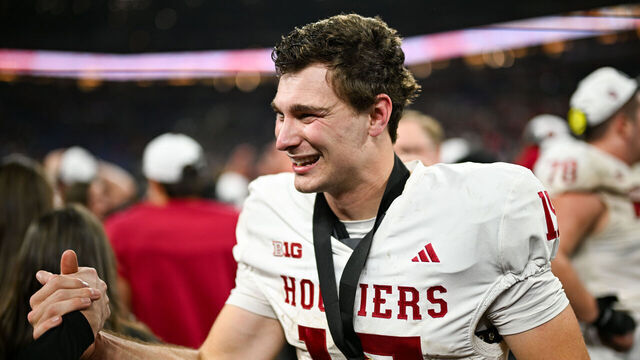 INDIANAPOLIS, IN - DECEMBER 06: Indiana Hoosiers QB Fernando Mendoza (15) celebrates winning the Big Ten Championship football game between the Indiana Hoosiers and the Ohio State Buckeyes on December 6, 2025 at Lucas Oil Stadium in Indianapolis, IN.
