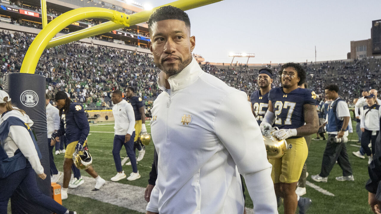 SOUTH BEND, IN - OCTOBER 11: Notre Dame Fighting Irish head coach Marcus Freeman exits the field after the game between NC State Wolfpack and Notre Dame Fighting Irish on October 11, 2025 at Notre Dame Stadium in South Bend, IN.