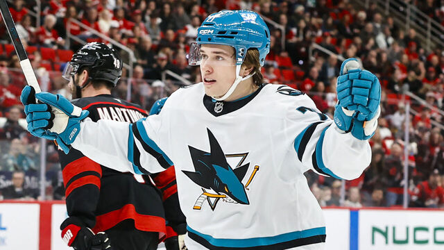 RALEIGH, NORTH CAROLINA - DECEMBER 07: Macklin Celebrini #71 of the San Jose Sharks reacts to a first period goal against the Carolina Hurricanes at the Lenovo Center on December 07, 2025 in Raleigh, North Carolina.