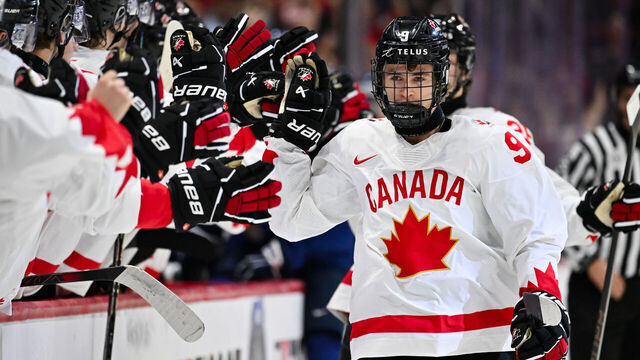 OTTAWA, CANADA - DECEMBER 26: Gavin McKenna #9 of Team Canada celebrates his goal with teammates on the bench during the first period at the 2025 IIHF World Junior Championship against Team Finland at Canadian Tire Centre December 26, 2024 in Ottawa, Ontario, Canada.