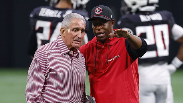 ATLANTA, GEORGIA - AUGUST 2: Atlanta Falcons owner Arthur Blank speaks with head coach Raheem Morris during NFL training camp at Mercedes-Benz Stadium on August 2, 2024 in Atlanta, Georgia.