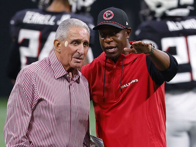 ATLANTA, GEORGIA - AUGUST 2: Atlanta Falcons owner Arthur Blank speaks with head coach Raheem Morris during NFL training camp at Mercedes-Benz Stadium on August 2, 2024 in Atlanta, Georgia.