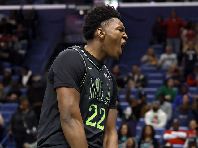 NEW ORLEANS, LOUISIANA - DECEMBER 08: Derik Queen #22 of the New Orleans Pelicans reacts after a play during the second half of a game against the San Antonio Spurs at Smoothie King Center on December 08, 2025 in New Orleans, Louisiana.