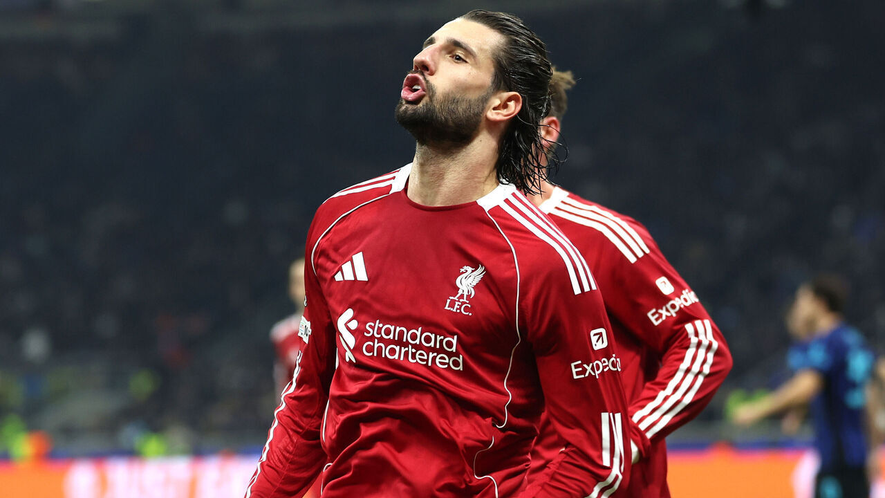 Liverpool's Dominik Szoboszlai (centre) celebrates scoring their side's first goal of the game from the penalty spot with team-mates during the UEFA Champions League match at the San Siro in Milan, Italy. Picture date: Tuesday December 9, 2025.