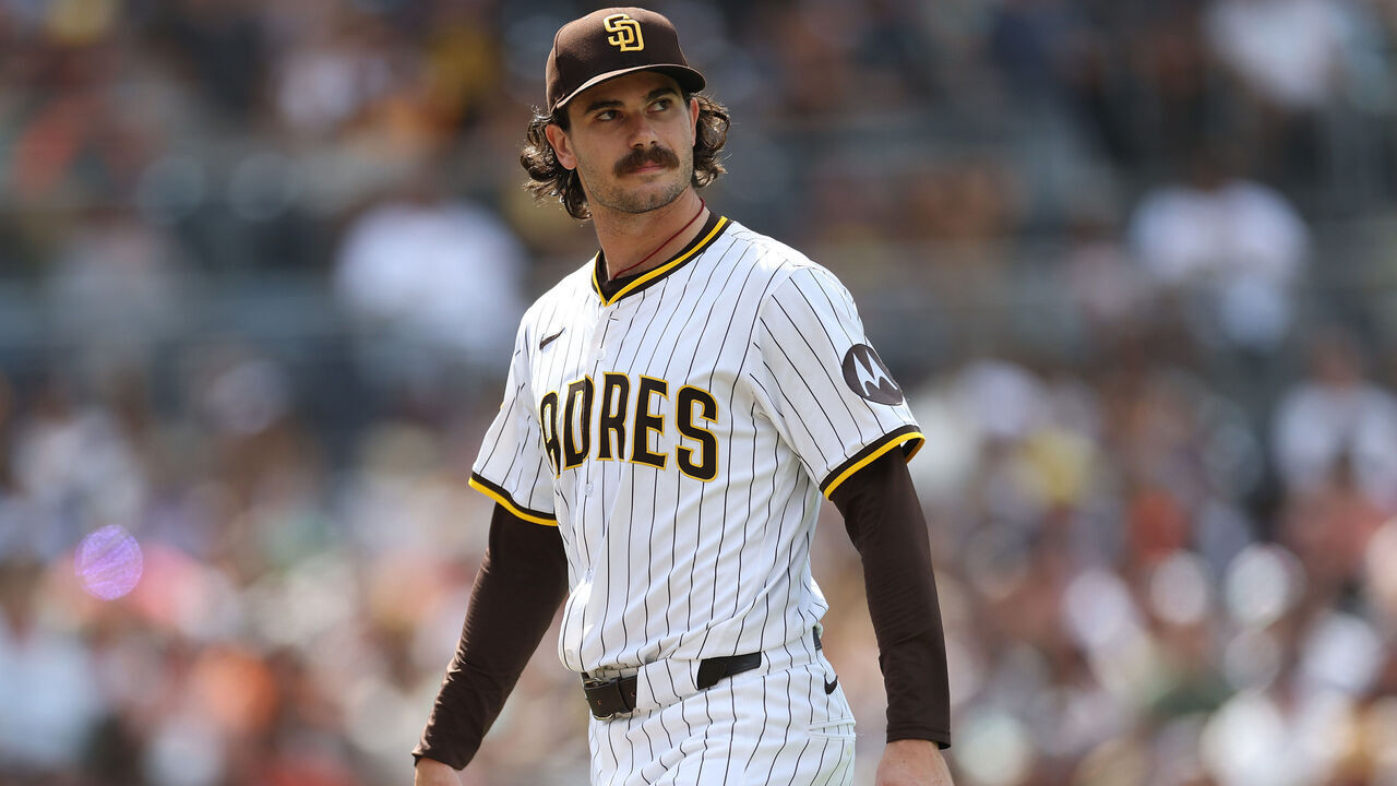 SAN DIEGO, CALIFORNIA - AUGUST 21: Dylan Cease #84 of the San Diego Padres walks to the dugout after being taken out of the game during the sixth inning of a game against the San Francisco Giants at Petco Park on August 21, 2025 in San Diego, California.