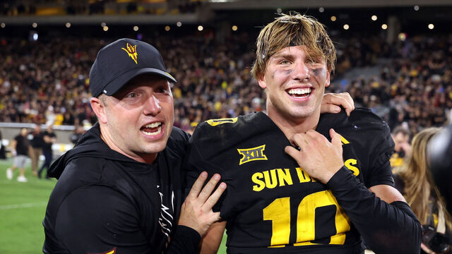 TEMPE, ARIZONA - SEPTEMBER 26: Head coach Kenny Dillingham celebrates with quarterback Sam Leavitt #10 of the Arizona State Sun Devils after defeating the TCU Horned Frogs 27-24 at Mountain America Stadium on September 26, 2025 in Tempe, Arizona.