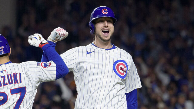 CHICAGO, ILLINOIS - OCTOBER 09: Kyle Tucker #30 of the Chicago Cubs celebrates a home run with Seiya Suzuki #27 during the seventh inning of Game Four of the National League Division Series against the Milwaukee Brewers at Wrigley Field on October 9, 2025 in Chicago, Illinois.