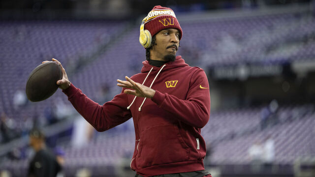 MINNEAPOLIS, MINNESOTA - DECEMBER 7: Jayden Daniels #5 of the Washington Commanders looks to pass during an NFL football game against the Minnesota Vikings at U.S. Bank Stadium on December 07, 2025 in Minneapolis, Minnesota.