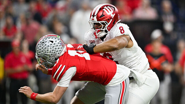 INDIANAPOLIS, IN - DECEMBER 06: Indiana Hoosiers DL Stephen Daley (8) hits Ohio State Buckeyes QB Julian Sayin (10) during the Big Ten Championship football game between the Indiana Hoosiers and the Ohio State Buckeyes on December 6, 2025 at Lucas Oil Stadium in Indianapolis, IN.