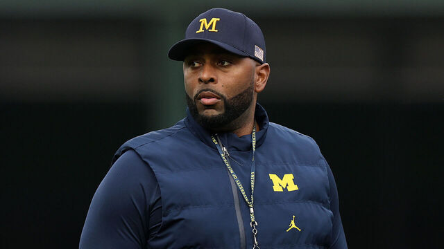 CHICAGO, ILLINOIS - NOVEMBER 15: Head coach Sherrone Moore of the Michigan Wolverines looks on prior to the game against the Northwestern Wildcats at Wrigley Field on November 15, 2025 in Chicago, Illinois.
