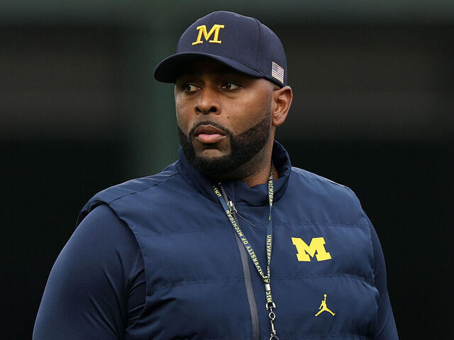 CHICAGO, ILLINOIS - NOVEMBER 15: Head coach Sherrone Moore of the Michigan Wolverines looks on prior to the game against the Northwestern Wildcats at Wrigley Field on November 15, 2025 in Chicago, Illinois.