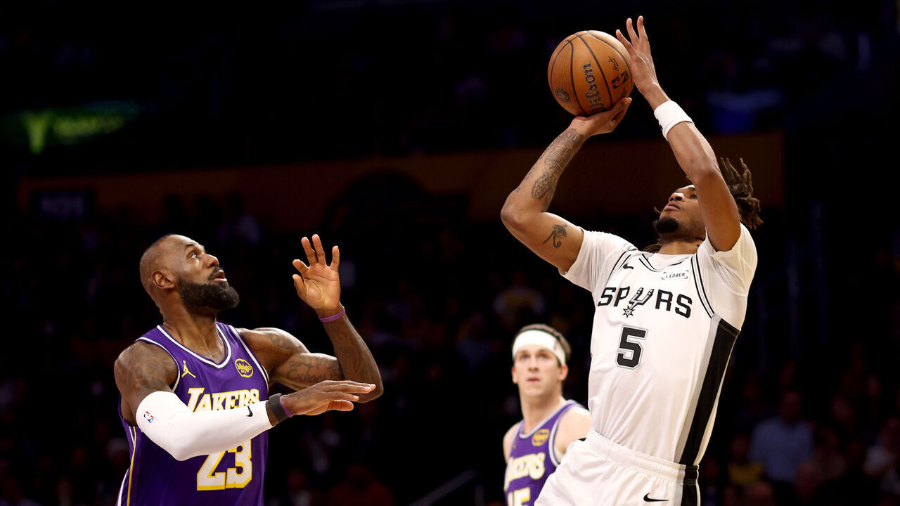 LOS ANGELES, CALIFORNIA - DECEMBER 10: Stephon Castle #5 of the San Antonio Spurs shoots the ball against Lebron James #23 of the Los Angeles Lakers during the first quarter of the Emirates NBA Cup quarterfinal at Crypto.com Arena on December 10, 2025 in Los Angeles, California. NOTE TO USER: User expressly acknowledges and agrees that, by downloading and/or using this Photograph, user is consenting to the terms and conditions of the Getty Images License Agreement.