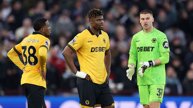 BIRMINGHAM, ENGLAND - NOVEMBER 30: Emmanuel Agbadou, Jackson Tchatchoua and Sam Johnstone of Wolverhampton Wanderers look dejected during the Premier League match between Aston Villa and Wolverhampton Wanderers at Villa Park on November 30, 2025 in Birmingham, England.