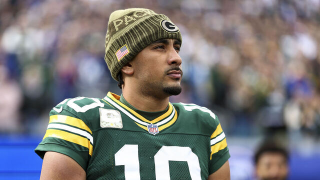 EAST RUTHERFORD, NEW JERSEY - NOVEMBER 16: Jordan Love #10 of the Green Bay Packers stands on the sidelines during the national anthem prior to an NFL football game against the New York Giants at MetLife Stadium on November 16, 2025 in East Rutherford, New Jersey.