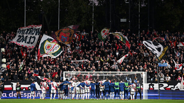 MADRID, SPAIN - NOVEMBER 09: Fans of Rayo Vallecano show their support by waving flags as players of Rayo Vallecano line up following the LaLiga EA Sports match between Rayo Vallecano de Madrid and Real Madrid CF at Estadio de Vallecas on November 09, 2025 in Madrid, Spain.