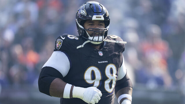 BALTIMORE, MARYLAND - OCTOBER 26: Travis Jones #98 of the Baltimore Ravens runs as he takes the field prior to an NFL football game against the Chicago Bears at M&T Bank Stadium on October 26, 2025 in Baltimore, Maryland.