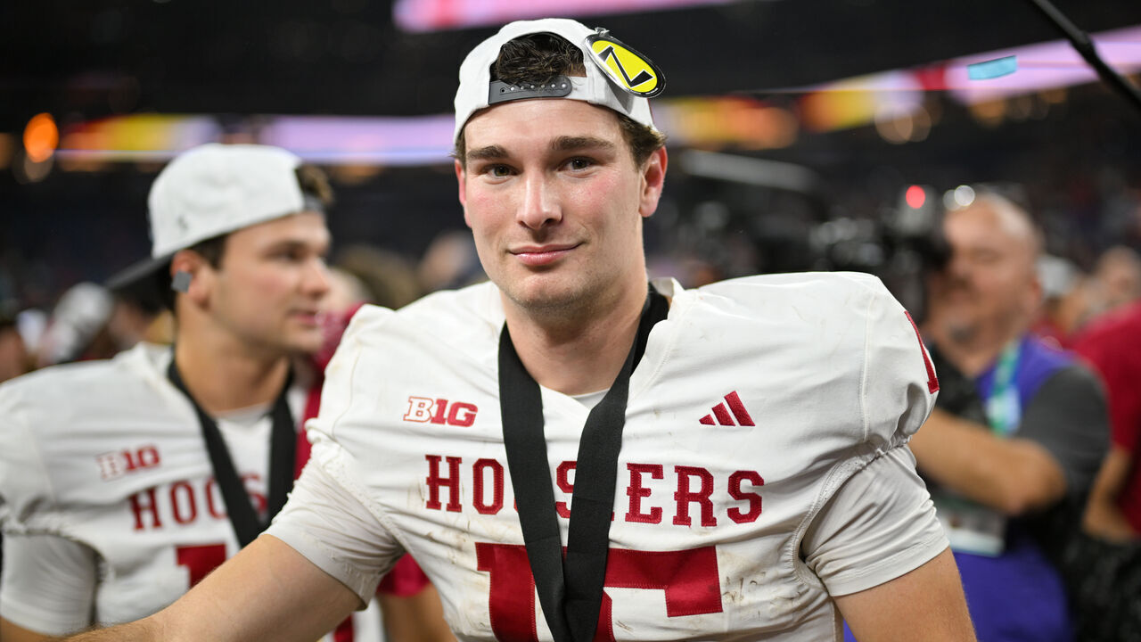 INDIANAPOLIS, IN - DECEMBER 06: Indiana Hoosiers QB Fernando Mendoza (15) celebrates winning the Big Ten Championship football game between the Indiana Hoosiers and the Ohio State Buckeyes on December 6, 2025 at Lucas Oil Stadium in Indianapolis, IN.