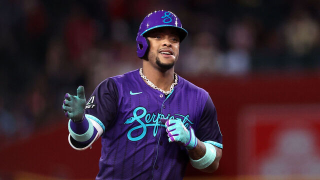 PHOENIX, ARIZONA - SEPTEMBER 19: Ketel Marte #4 of the Arizona Diamondbacks gestures while running the bases after hitting a solo home run against the Philadelphia Phillies during the first inning at Chase Field on September 19, 2025 in Phoenix, Arizona.