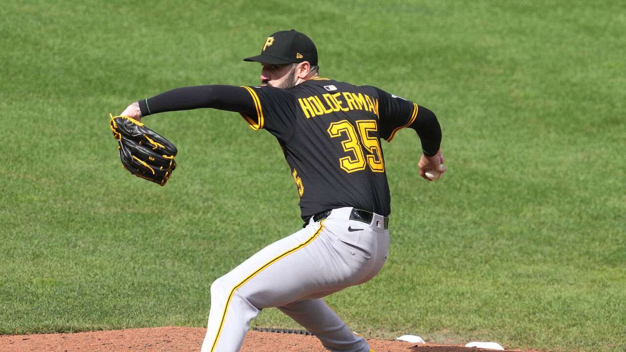 BALTIMORE, MD - SEPTEMBER 11: Colin Holderman #35 of the Pittsburgh Pirates pitches during a baseball game against the Baltimore Orioles at Oriole Park at Camden Yards on September 11, 2025 in Baltimore, Maryland.